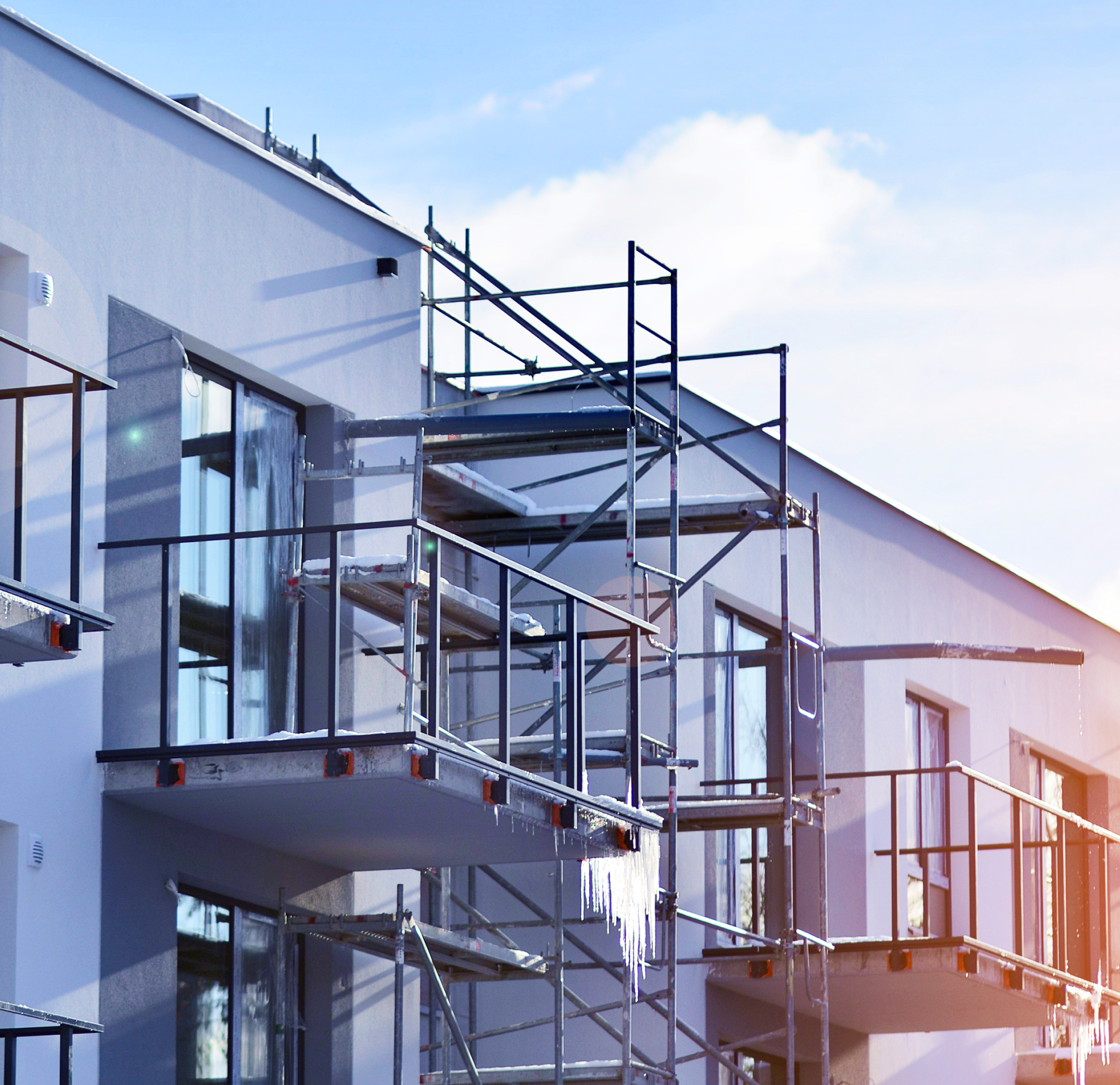 Modern building under construction with scaffolding